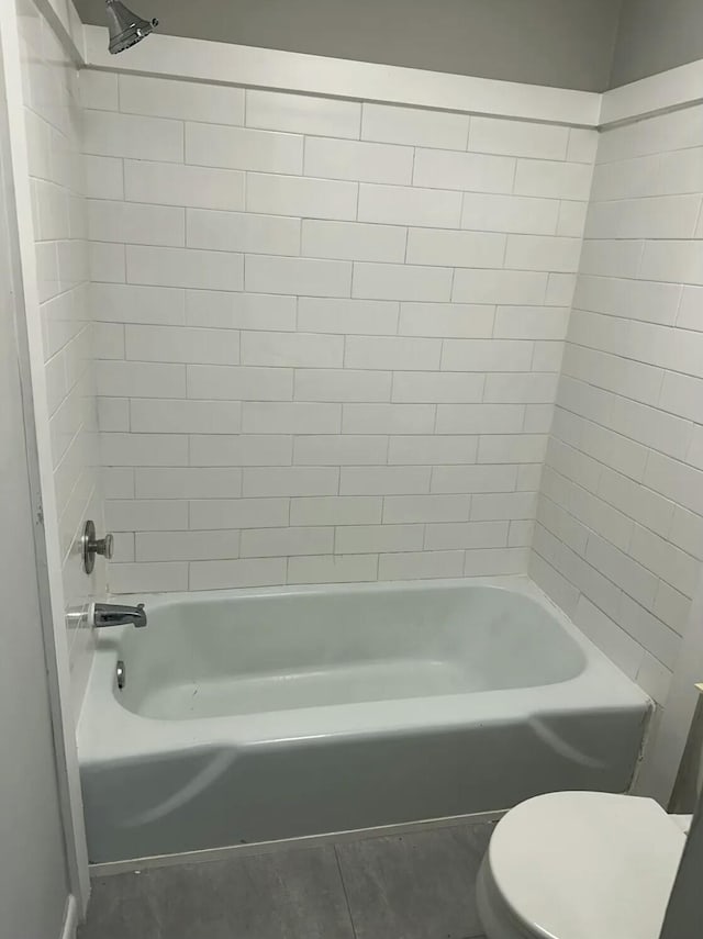 810 Forest Dale Ln, Hixson, TN 37343 - full bathroom featuring tub / shower combination, tile patterned flooring, and toilet