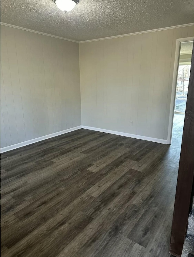 810 Forest Dale Ln, Hixson, TN 37343 - empty room with dark wood-type flooring, a textured ceiling, and ornamental molding