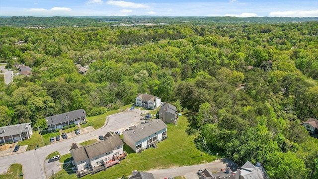 aerial view featuring a view of trees