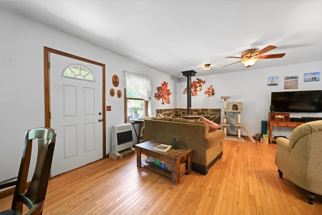 798 Deerfield Ln, Sugar Valley, GA 30746 - living room featuring light wood-type flooring, heating unit, and ceiling fan