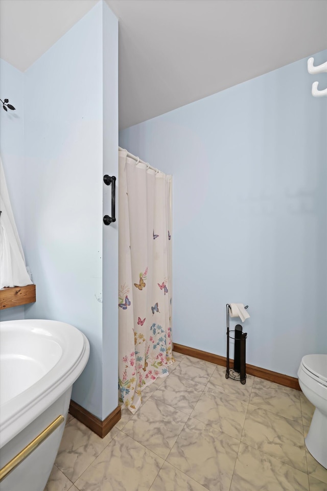 798 Deerfield Ln, Sugar Valley, GA 30746 - bathroom with marble finish floor, baseboards, toilet, and curtained shower