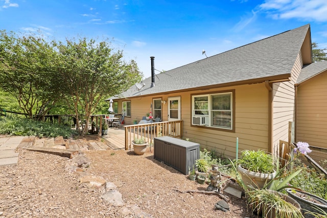 798 Deerfield Ln, Sugar Valley, GA 30746 - back of property with a wooden deck and a shingled roof