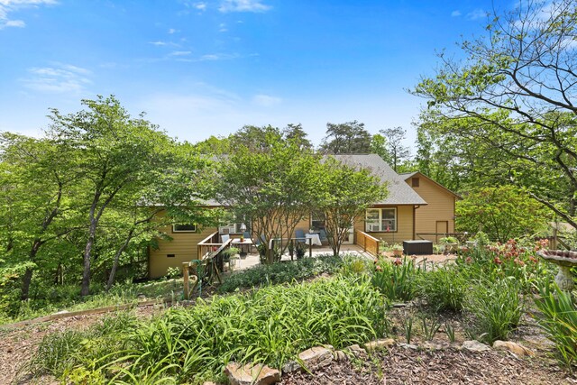 798 Deerfield Ln, Sugar Valley, GA 30746 - rear view of property featuring a patio area and roof with shingles