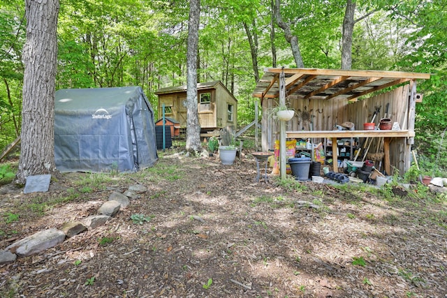 798 Deerfield Ln, Sugar Valley, GA 30746 - view of yard with an outbuilding