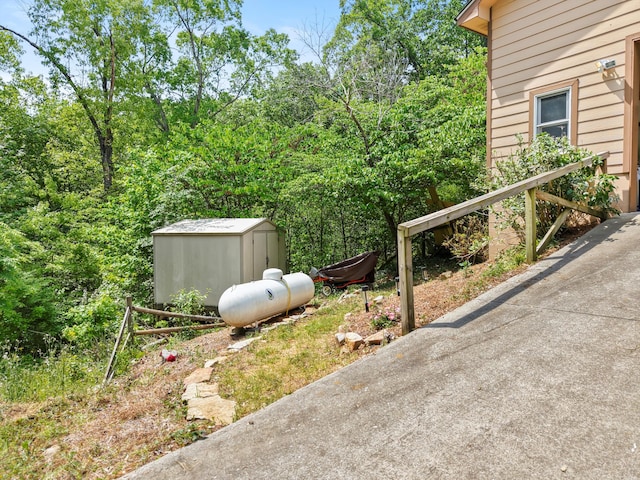 798 Deerfield Ln, Sugar Valley, GA 30746 - view of yard featuring a storage shed and an outdoor structure