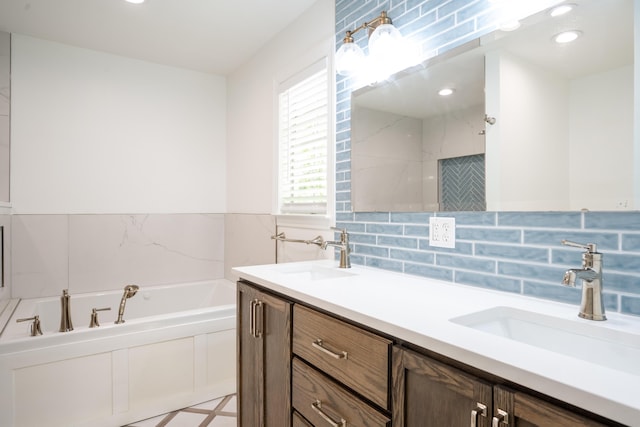 4802 Woodland Cir, Hixson, TN 37343 - full bath with tasteful backsplash, double vanity, a garden tub, and a sink