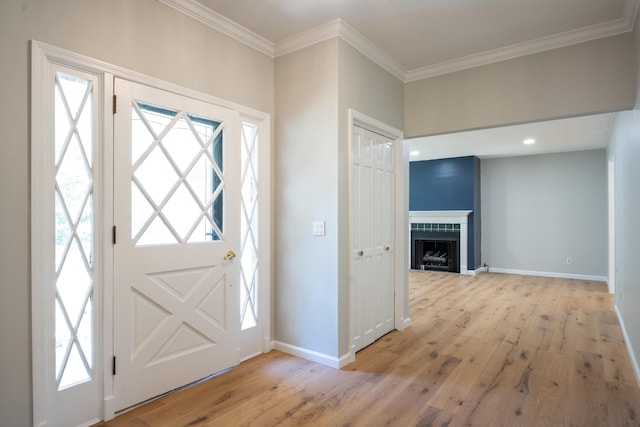 4802 Woodland Cir, Hixson, TN 37343 - entryway with baseboards, ornamental molding, light wood-style floors, and a wealth of natural light