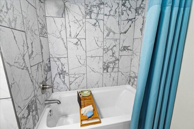 full bathroom with shower / tub combo with curtain