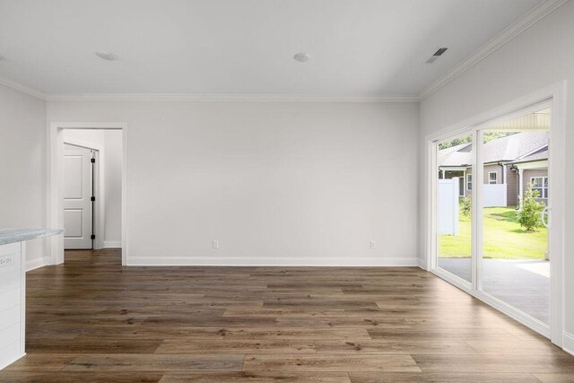 1571 Whisper Winds Ln Unit 42, Ooltewah, TN 37363 - unfurnished room with ornamental molding and wood finished floors