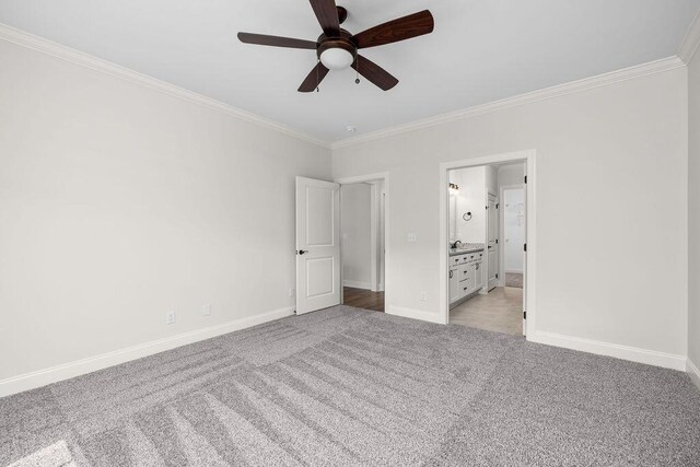 1571 Whisper Winds Ln Unit 42, Ooltewah, TN 37363 - unfurnished bedroom featuring light colored carpet, crown molding, connected bathroom, and a ceiling fan