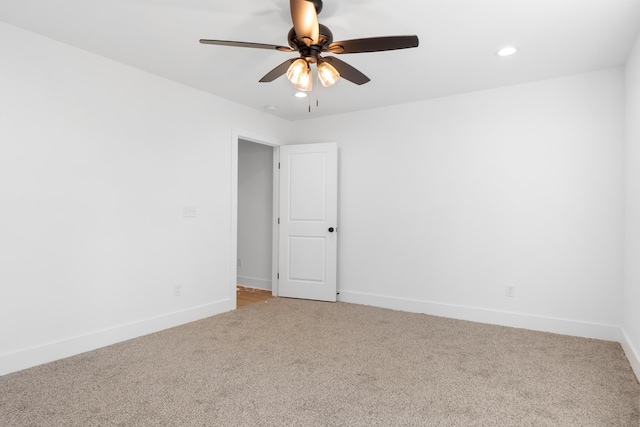 unfurnished room with ceiling fan, baseboards, recessed lighting, and light colored carpet