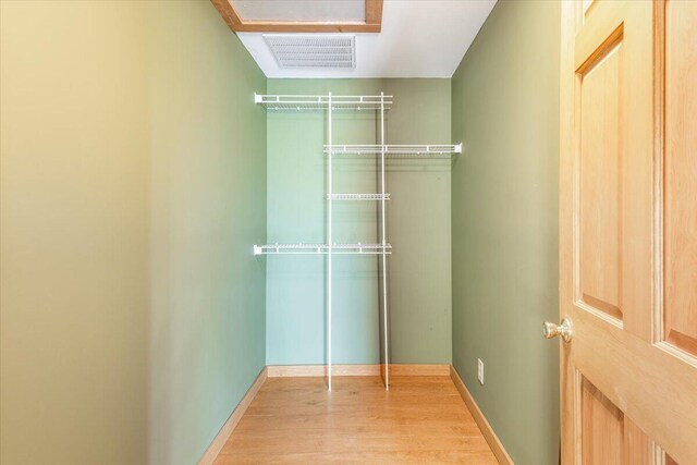 159 Eagle Creek Trl, Rising Fawn, GA 30738 - walk in closet with wood finished floors and visible vents