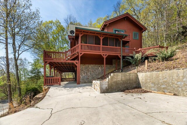 159 Eagle Creek Trl, Rising Fawn, GA 30738 - view of front of house featuring stone siding and a deck
