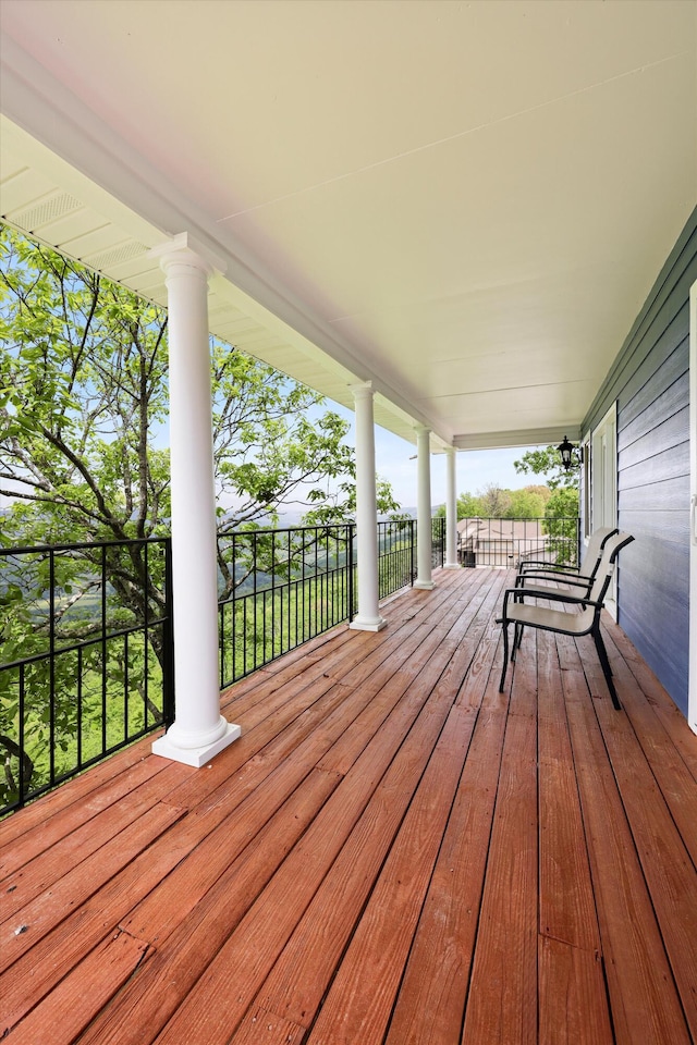 wooden terrace with covered porch