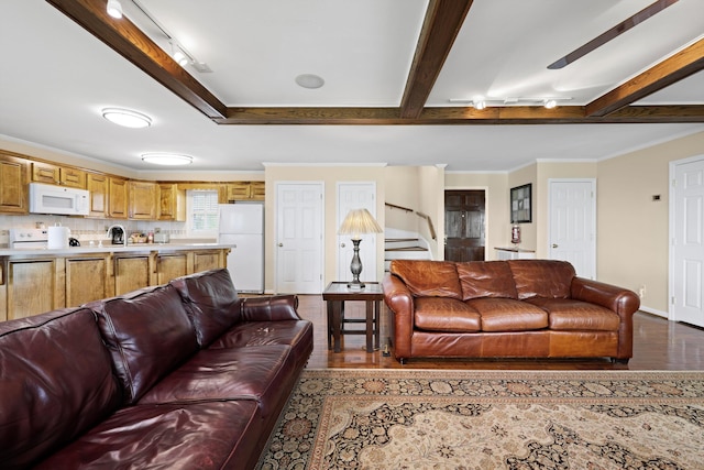 living area with stairway, dark wood-style floors, ornamental molding, beamed ceiling, and baseboards