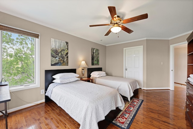bedroom featuring wood-type flooring, baseboards, ornamental molding, and ceiling fan