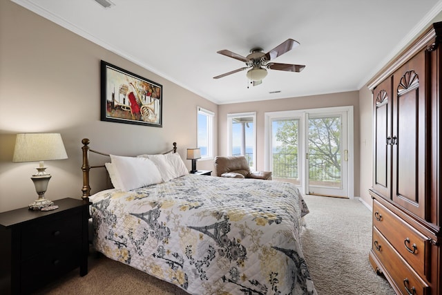 carpeted bedroom featuring a ceiling fan, baseboards, access to outside, and ornamental molding