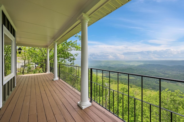 deck with a wooded view