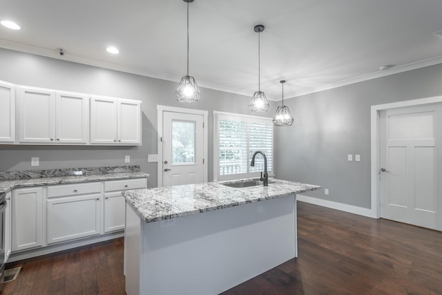 229 Courtland Crest Dr SW, Cleveland, TN 37311 - kitchen with a sink, white cabinetry, light stone countertops, dark wood finished floors, and ornamental molding