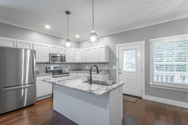 229 Courtland Crest Dr SW, Cleveland, TN 37311 - kitchen with stainless steel appliances, a sink, light stone counters, crown molding, and dark wood-type flooring