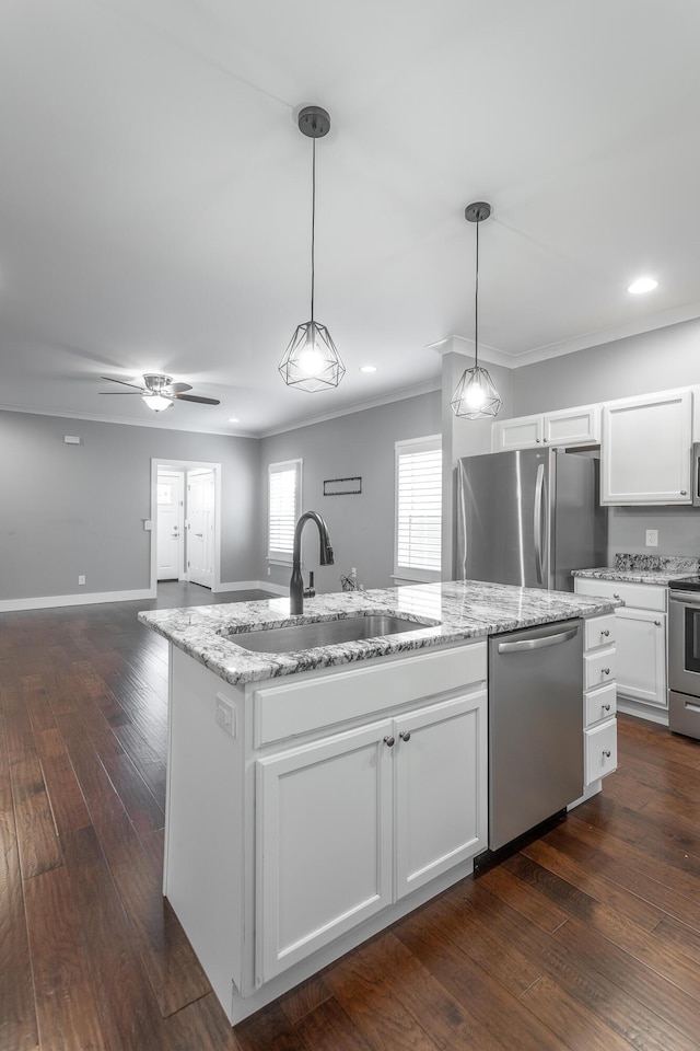 229 Courtland Crest Dr SW, Cleveland, TN 37311 - kitchen with appliances with stainless steel finishes, a sink, dark wood-type flooring, white cabinets, and open floor plan