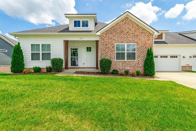 3495 Travertine Ln, Chattanooga, TN 37405 - view of front facade with brick siding, a garage, driveway, roof with shingles, and a front lawn