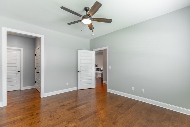 3495 Travertine Ln, Chattanooga, TN 37405 - unfurnished bedroom featuring dark wood-style flooring, ceiling fan, and baseboards