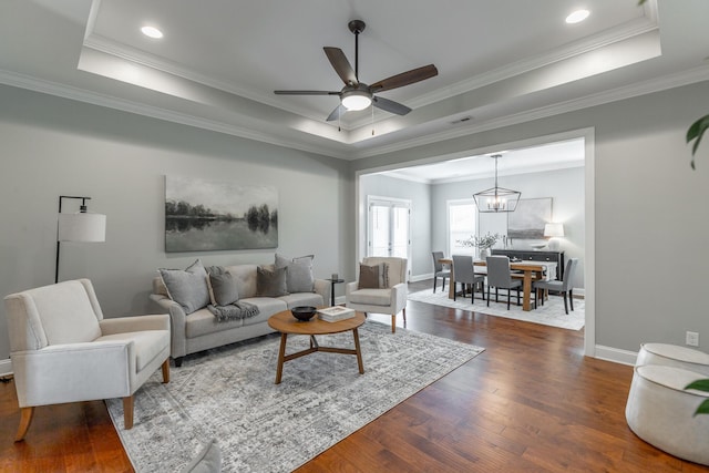3495 Travertine Ln, Chattanooga, TN 37405 - living area with baseboards, wood finished floors, and a tray ceiling
