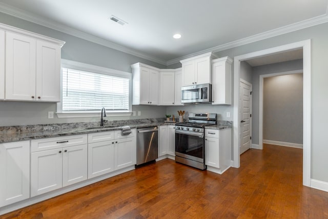 3495 Travertine Ln, Chattanooga, TN 37405 - kitchen with a sink, light stone countertops, visible vents, and appliances with stainless steel finishes