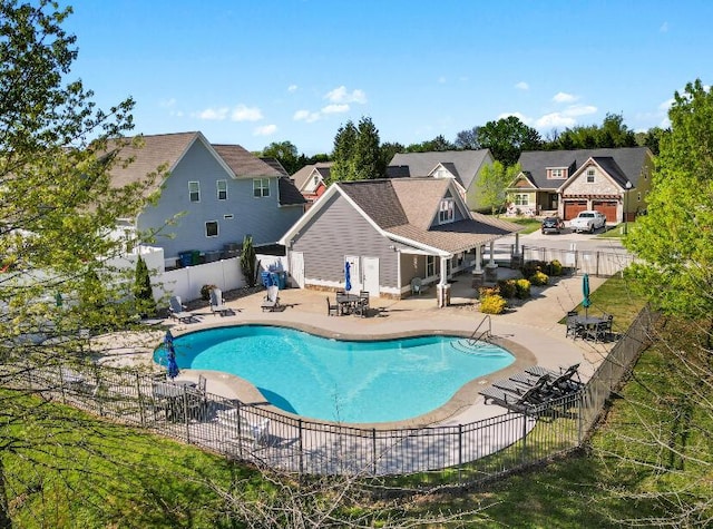 8209 Robertsview Dr, Ooltewah, TN 37363 - view of swimming pool with a fenced backyard, a patio area, and a residential view