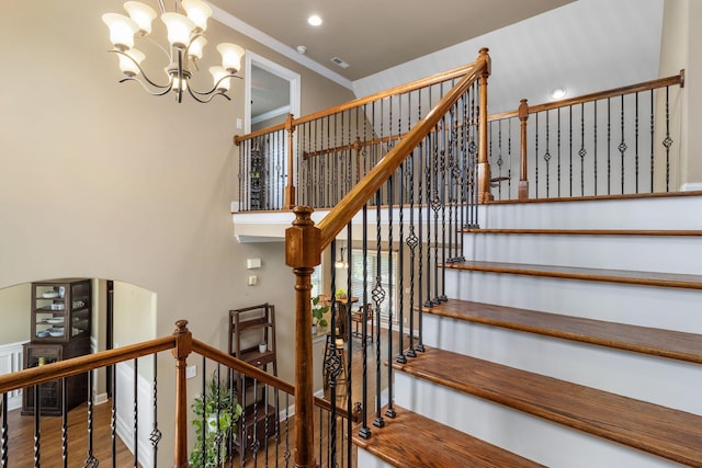 8209 Robertsview Dr, Ooltewah, TN 37363 - stairway featuring wood finished floors, a chandelier, baseboards, and recessed lighting