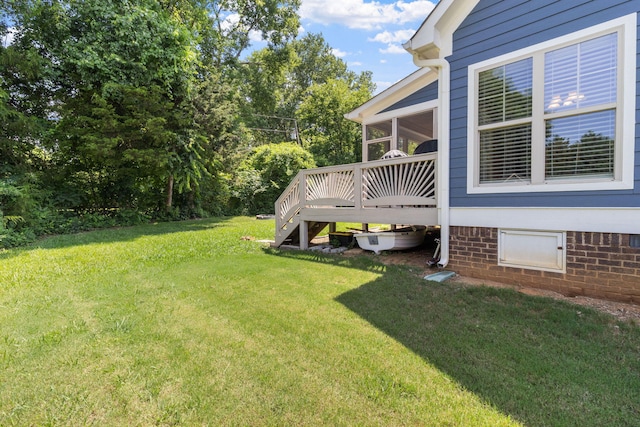 8209 Robertsview Dr, Ooltewah, TN 37363 - view of green lawn featuring a sunroom and a wooden deck