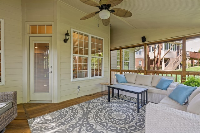 exterior space featuring a ceiling fan, a wealth of natural light, and an outdoor hangout area