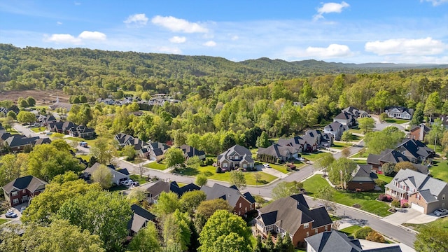 aerial view featuring a residential view and a forest view