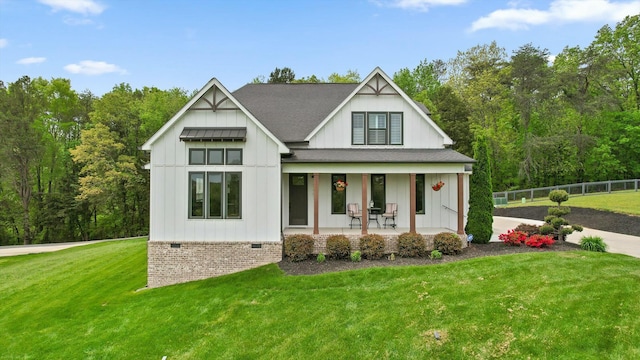 7407 Pond Vw, Harrison, TN 37341 - modern farmhouse with fence, board and batten siding, a porch, and a front lawn