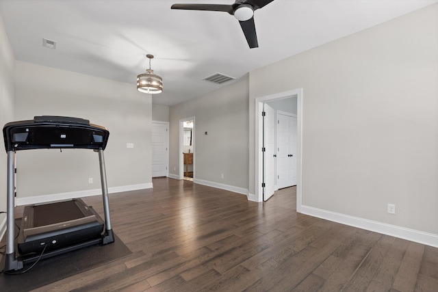 7407 Pond Vw, Harrison, TN 37341 - workout room featuring baseboards, visible vents, and wood finished floors
