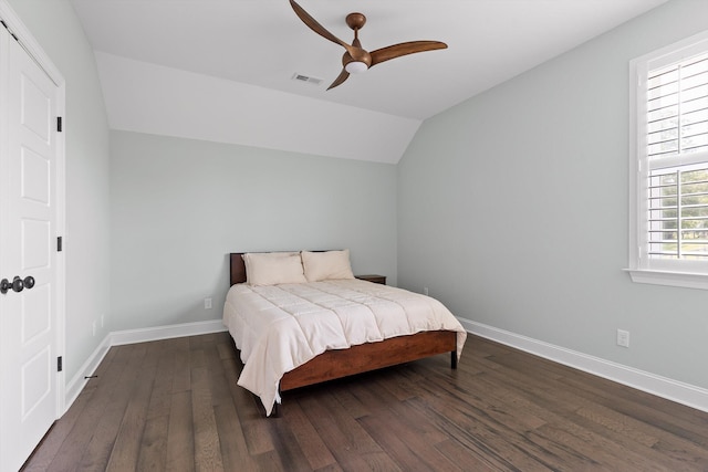 7407 Pond Vw, Harrison, TN 37341 - bedroom with baseboards, visible vents, wood finished floors, and lofted ceiling