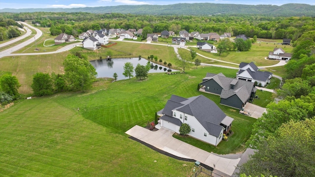 7407 Pond Vw, Harrison, TN 37341 - aerial view featuring a water view, a residential view, and a wooded view
