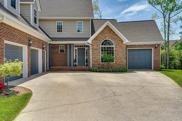 3874 Sweet Bay Ln, Apison, TN 37302 - traditional home with a garage, a shingled roof, stone siding, and concrete driveway