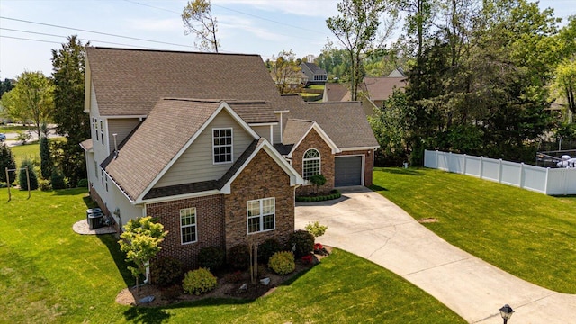 3874 Sweet Bay Ln, Apison, TN 37302 - craftsman-style house with an attached garage, central AC unit, a front lawn, and concrete driveway