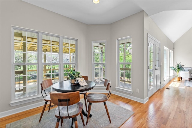 3874 Sweet Bay Ln, Apison, TN 37302 - dining room with light wood-type flooring, baseboards, lofted ceiling, and visible vents