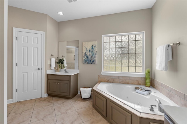3874 Sweet Bay Ln, Apison, TN 37302 - bathroom with tile patterned flooring, a tub with jets, vanity, and visible vents