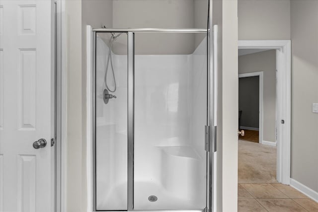 3874 Sweet Bay Ln, Apison, TN 37302 - full bath featuring baseboards, tile patterned floors, and a stall shower