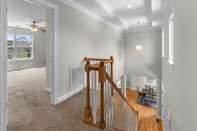 3874 Sweet Bay Ln, Apison, TN 37302 - corridor featuring visible vents, baseboards, ornamental molding, and an upstairs landing