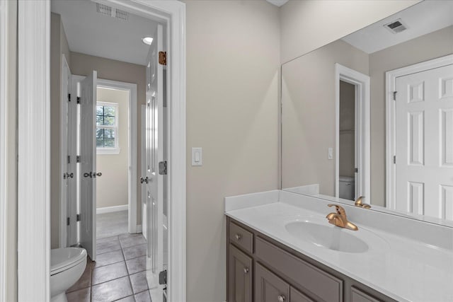 3874 Sweet Bay Ln, Apison, TN 37302 - bathroom with visible vents, toilet, vanity, and tile patterned floors