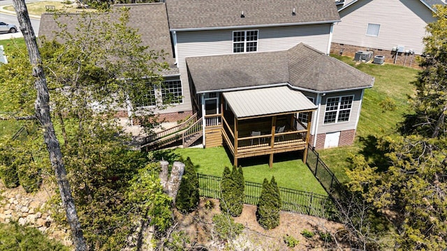 3874 Sweet Bay Ln, Apison, TN 37302 - back of house with a fenced backyard, a sunroom, a deck, and a yard