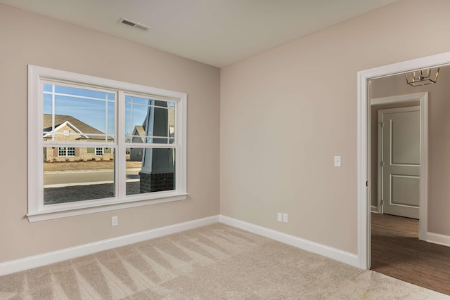 370 Winchester Dr Unit 70, Rossville, GA 30741 - spare room featuring baseboards, visible vents, and carpet floors