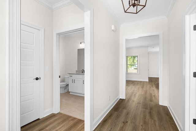 370 Winchester Dr Unit 70, Rossville, GA 30741 - hallway featuring a chandelier, dark wood finished floors, and crown molding