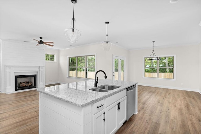 370 Winchester Dr Unit 70, Rossville, GA 30741 - kitchen featuring stainless steel dishwasher, open floor plan, light wood finished floors, plenty of natural light, and crown molding