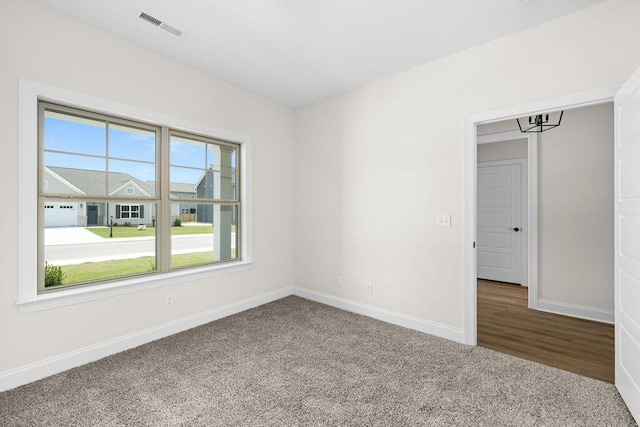370 Winchester Dr Unit 70, Rossville, GA 30741 - spare room featuring carpet floors and baseboards
